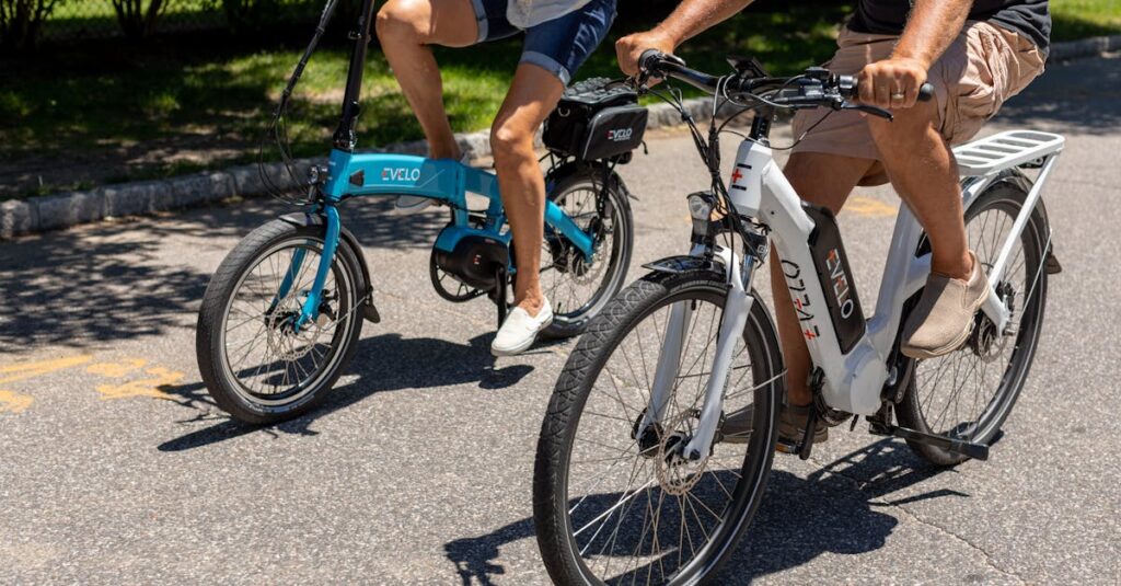 A couple enjoying a ride on electric bikes during a sunny day in Patchogue, NY.